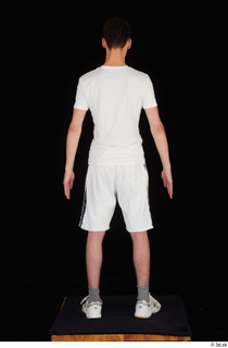  Johnny Reed dressed grey shorts sneakers sports standing white t shirt whole body 0005.jpg